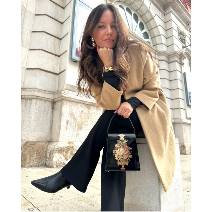 RENÉ pochette scultura